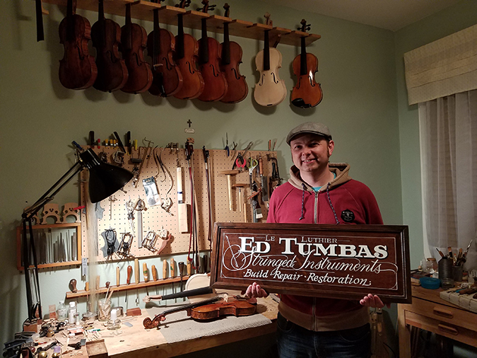 Tumbas in his violin workshop.