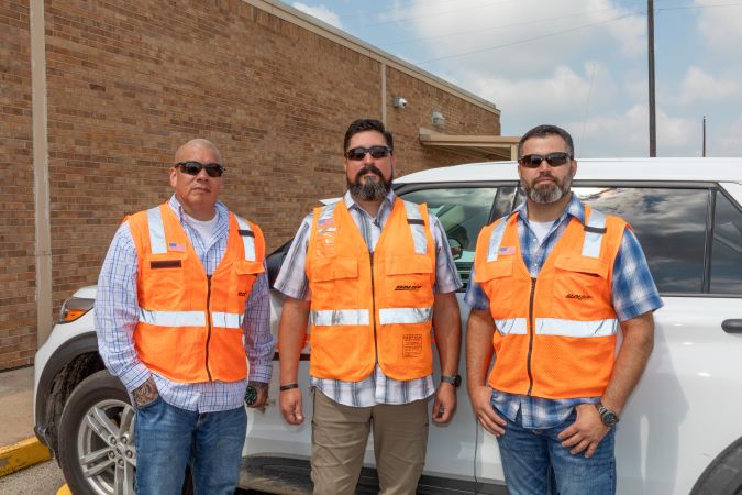 Carmona (left) and Galindo (right) with Terminal Superintendent Ty Christian (center).