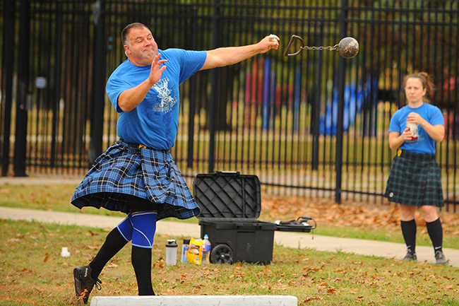 Wearing his family clan tartan, Tedd competes in the weight-for-distance event.