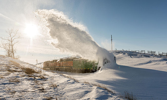 A rotary snowplow at work  A rotary snowplow at work